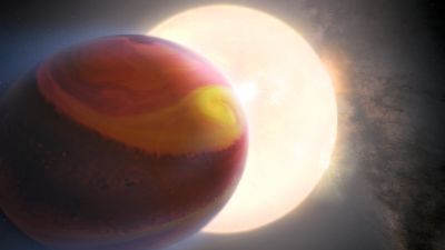 Impresión artística del exoplaneta Júpiter ultracaliente WASP-121 b (Tylos) orbitando su estrella anfitriona, con atmósfera bandeada en rojo, amarillo y naranja.