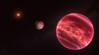 Impresión artística del sistema CD-35 2722: un cuerpo con masa similar a Júpiter, tipo luna, orbitando una enana marrón que a su vez orbita una estrella de baja masa.