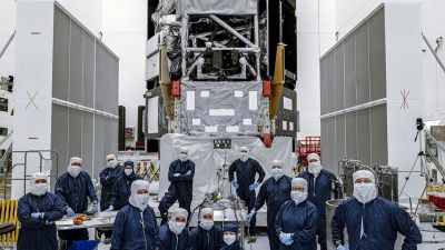 NASA's Nancy Grace Roman Space Telescope team poses with the observatory at Kennedy Space Center on July 20, 2026, prior to fueling operations. Credit: NASA/Sydney Rohde