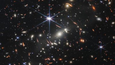 JWST NIRCam first deep field image of galaxy cluster SMACS 0723, illustrating reionization-era galaxies observed by NIRSpec.