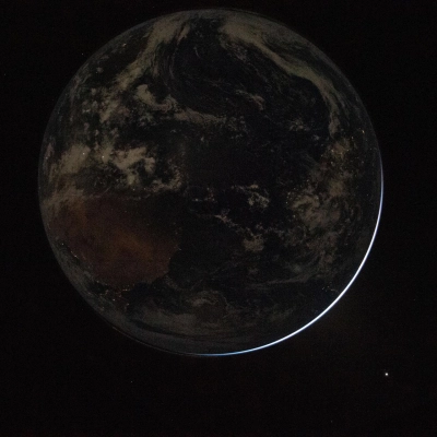 art002e000193 (April 3, 2026) - A view of a backlit Earth taken by NASA astronaut and Artemis II Commander Reid...