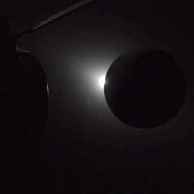 art002e009575 (April 6, 2026) - The Sun is rising at the left edge of the Moon, ending a nearly one-hour...