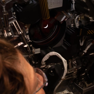 art002e009274 (April 6, 2026) - Artemis II mission specialist and NASA astronaut Christina Koch looks out one of the Orion...