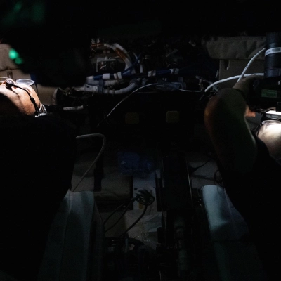 art002e009293 (April 6, 2026) – Artemis II Pilot Victor Glover and Mission Specialist Christina Koch gather images and observations of...