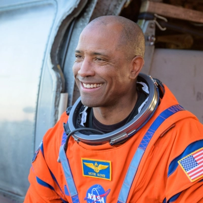 NASA astronaut Victor Glover, Artemis II pilot is seen sitting in a Navy MH-60 Seahawk from Helicopter Sea Combat Squadron...