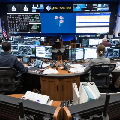 jsc2026e022251(April 10, 2026) - Artemis II Flight Control Team pictured at consoles within the White Flight Control Room in the...