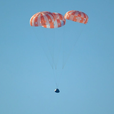 NASA’s Orion spacecraft with Artemis II crewmembers NASA astronauts Reid Wiseman, commander; Victor Glover, pilot; Christina Koch, mission specialist; and...