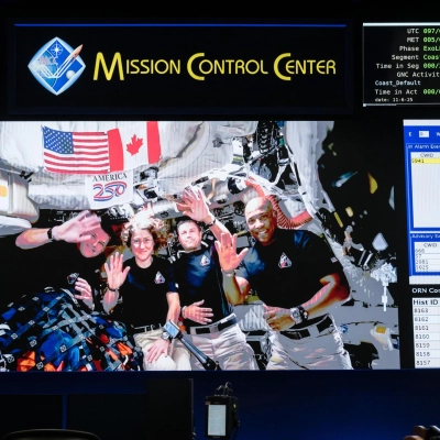 jsc2026e020504 (April 6, 2026) - The Artemis II crew – CSA (Canadian Space Agency) Astronaut Jeremy Hansen (far left) and...