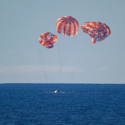 NASA’s Orion spacecraft with Artemis II crewmembers NASA astronauts Reid Wiseman, commander; Victor Glover, pilot; Christina Koch, mission specialist; and...
