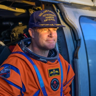 CSA (Canadian Space Agency) astronaut Jeremy Hansen, Artemis II mission specialist is seen sitting in a Navy MH-60 Seahawk from...
