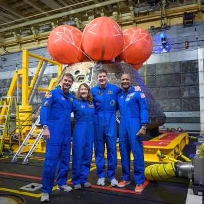 NASA astronauts Reid Wiseman, commander; left, Christina Koch, mission specialist; CSA (Canadian Space Agency) astronaut Jeremy Hansen, mission specialist; and...