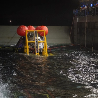 NASA’s Orion spacecraft is seen as the agency’s Landing and Recovery team, along with U.S. Navy personnel work to recover...