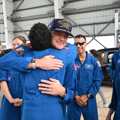CSA (Canadian Space Agency) astronaut and Artemis II Mission Specialist Jeremy Hansen is greeted by NASA astronaut Jessica Watkins and...