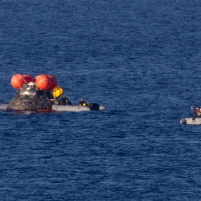 NASA’s Orion spacecraft is seen as recovery teams work to secure the spacecraft ahead of transferring Artemis II crewmembers NASA...
