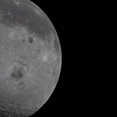 art002e009278 (April 6, 2026) - Just over half of the Moon fills the left half of the image. The near...