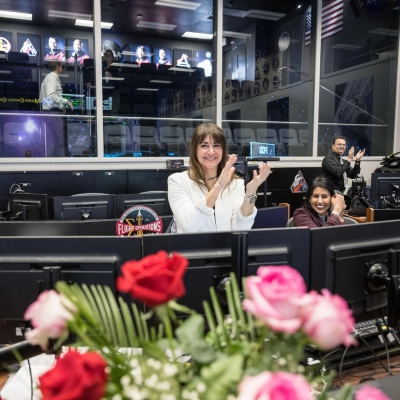 jsc2026e020501 (April 6, 2026) - NASA Flight Directors Diane Dailey, Pooja Jesrani, and Paul Konyha pictured in the White Flight...