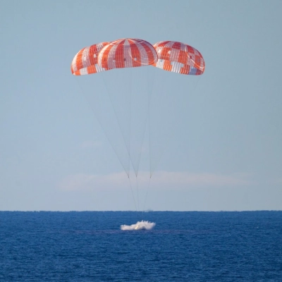 NASA’s Orion spacecraft with Artemis II crewmembers NASA astronauts Reid Wiseman, commander; Victor Glover, pilot; Christina Koch, mission specialist; and...