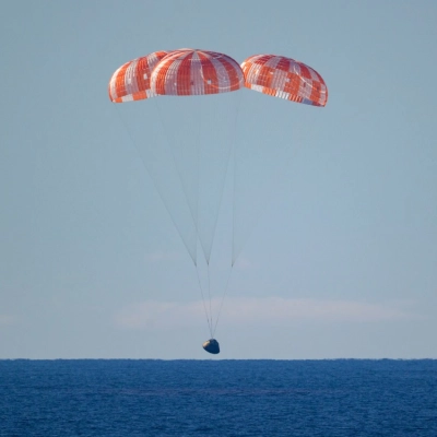 NASA’s Orion spacecraft with Artemis II crewmembers NASA astronauts Reid Wiseman, commander; Victor Glover, pilot; Christina Koch, mission specialist; and...