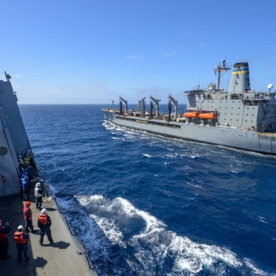 The USNS Guadalupe (T-AO 200) replenishment oiler prepares to refuel USS John P. Murtha (LPD 26) as NASA, U.S. Navy,...